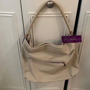 Large tan shoulder bag